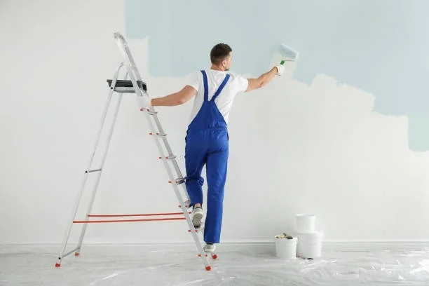 Painter rolling paint on wall – Mr.Helper painting service